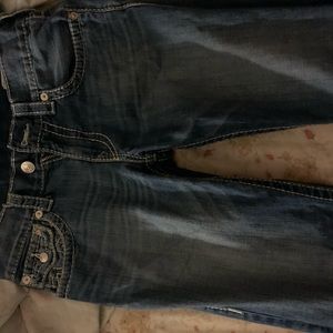 Two pairs of true religions straight fit